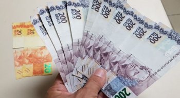 A bombeiro foi autuada pelo crime de introduzir em circulação nota falsa