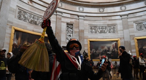 Supporters of US President Donald Trump enter the US Capitols Rotunda on January 6, 2021, in Washington, DC. Demonstrators breeched security and entered the Capitol as Congress debated the a 2020 presidential election Electoral Vote Certification. / AFP 