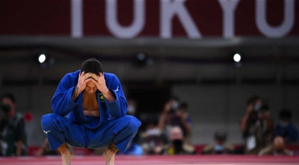 O brasileiro Daniel Cargnin faturou a medalha de bronze na categoria meio-leve (at&eacute; 66 kg) em T&oacute;quio 2020