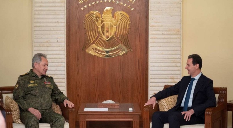 Presidente da Síria, Bashar al-Assad, e ministro da Defesa russo,Sergei Shoigu