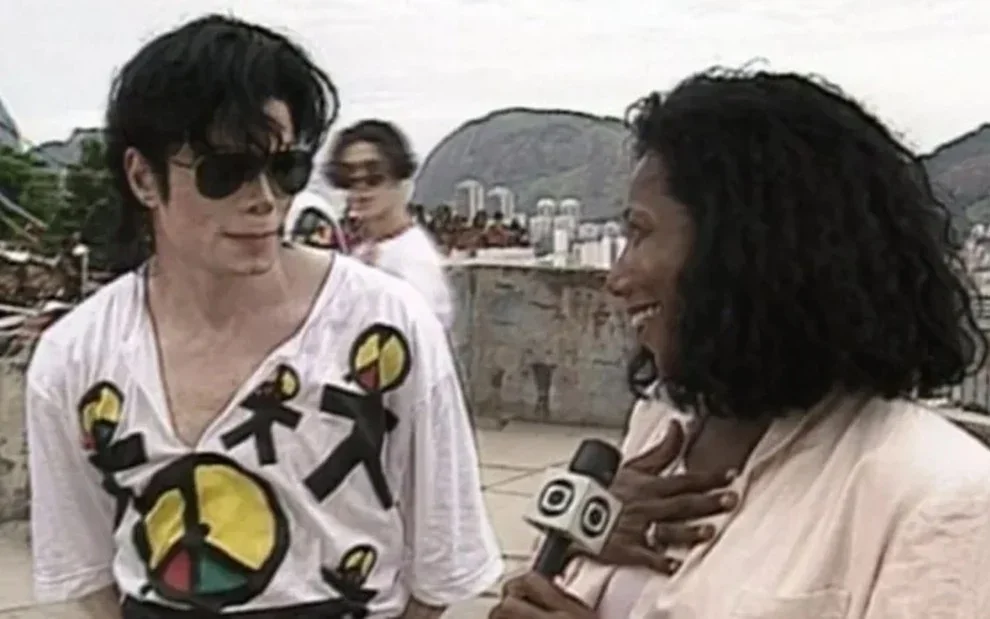 Glória Maria com Michael Jackson Reprodução/TV Globo