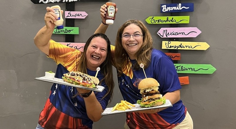 As imigrantes venezuelanas Isabel Alcalá e Madelin Arteaga, que comandam a hamburgueria Planet Food