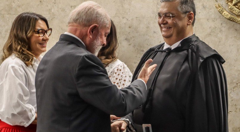 O ministro Flavio Dino e o presidente Lula durante cerimônia de posse