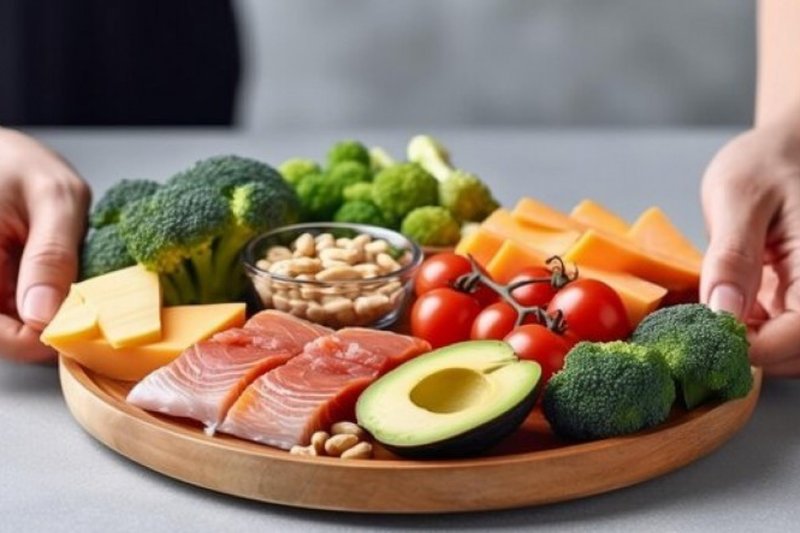 Imagem ilustrativa de vegetais, peixe e grãos