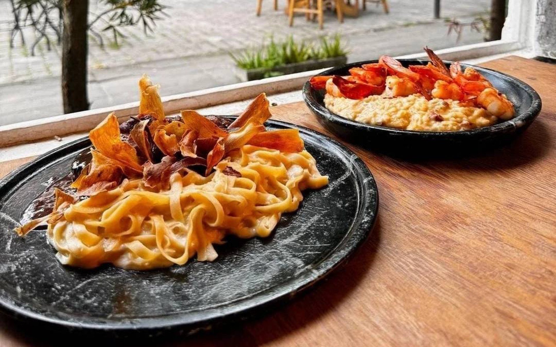 Imagem de pratos no restaurante Nommade Bistrot