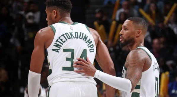 Imagem de Giannis Antetokounmpo e Damian Lillard, jogadores do Milwaukee Bucks