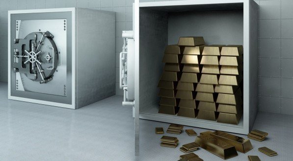 Imagem ilustrativa de baú com barras de ouro.