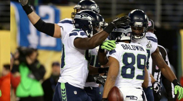 Atletas do Seattle Seahawks reunidos