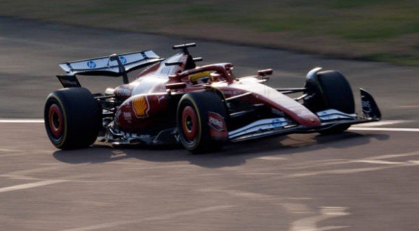 British driver Lewis Hamilton steers the new F1 Ferrari SF-25 during tests at Fiorano Circuit on February 19, 2025 in Fiorano Modenese near Maranello. (Photo by Federico SCOPPA / AFP) (Photo by FEDERICO SCOPPA/AFP via Getty Images)