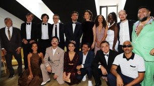 Imagem da equipe de 'O Agente Secreto' na premiere do longa-metragem em Cannes