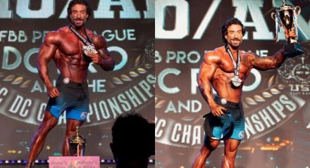 Diogo Basaglia levantando troféu de Men 's Physique 

