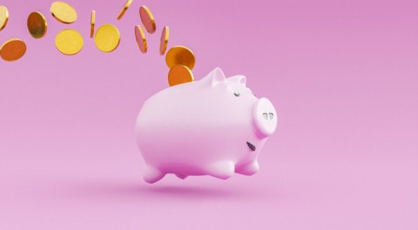 Imagem ilustrativa de um cofre de porquinho com dinheiro!