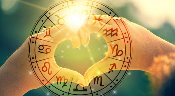 The hands of women and men are the heart shape with the sun light passing through the hands have astrological symbols