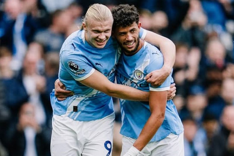 Haaland e Matheus Nunes comemoram gol do Manchester City