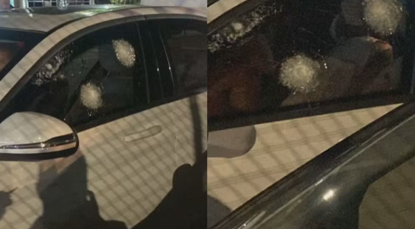 Imagem ilustrativa de carro com marcas de tiros