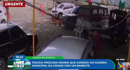 Imagem de homem portando um barrote para agredir guarda municipal