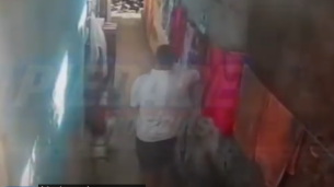 Imgem de homem furtando roupas em um beco de Setúbal, Boa Viagem