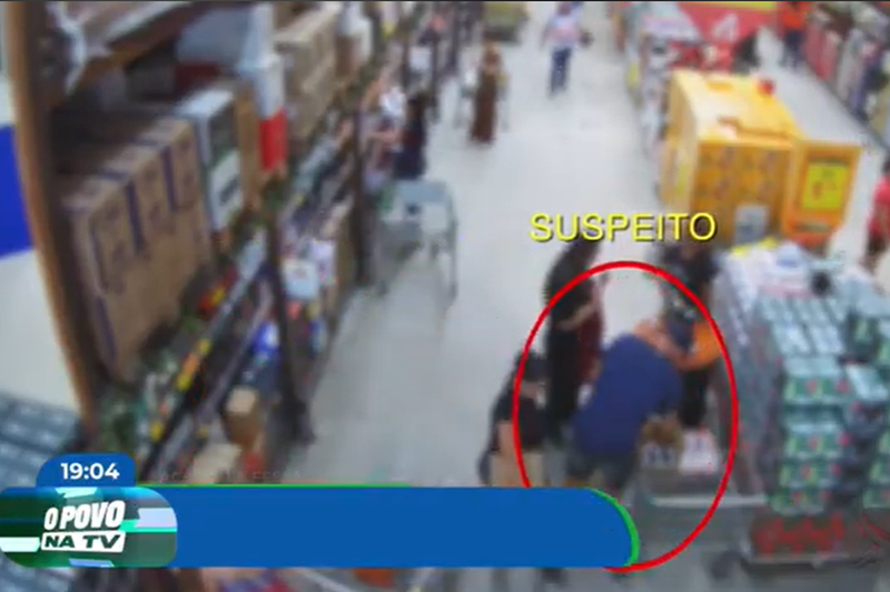 Imagem de homem roubando em supermercado